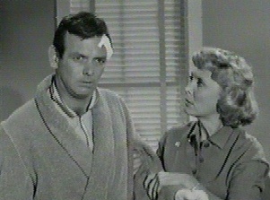 Betty Garrett helps Kimble when his head is not working right
