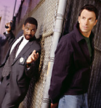 Mykelti Williamson and Tim Daly from the 2000 version of THE FUGITIVE